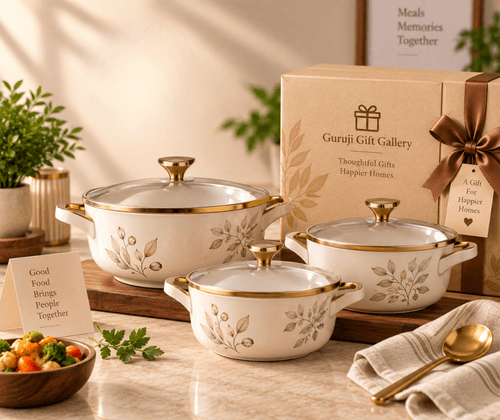 Set of three white casseroles with gold rims and glass lids